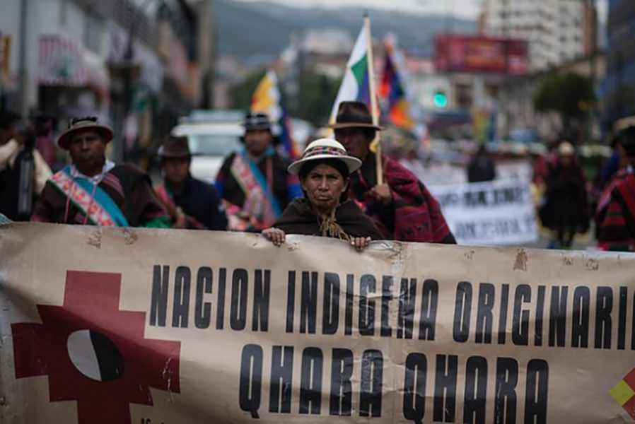 Medlemmar av Qhara Qhara-nationen når staden La Paz den 18 mars efter en nästan 70 mil lång marsch.