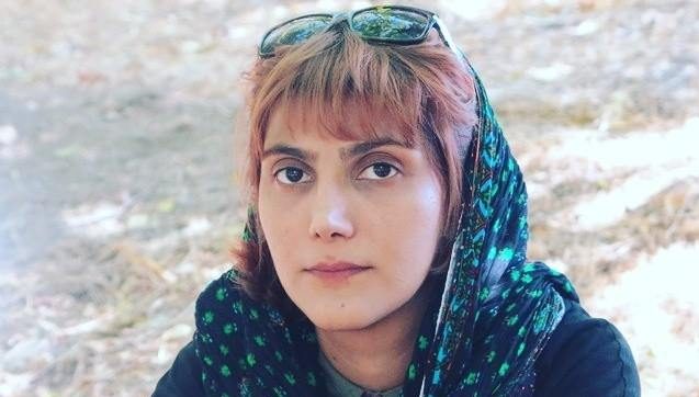 Marzieh Amiri greps den första maj i år utanför parlamentsbyggnaden i Teheran tillsammans med en grupp första maj-demonstranter.