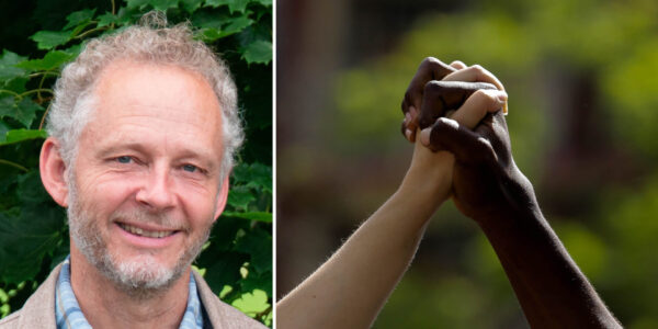 Nikolas Berg till vänster. Till höger två händer, en svart och en vit, som håller om varandra.