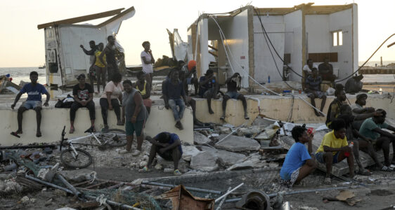 människor sitter i husbråte