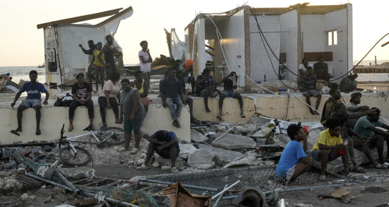 människor sitter i husbråte