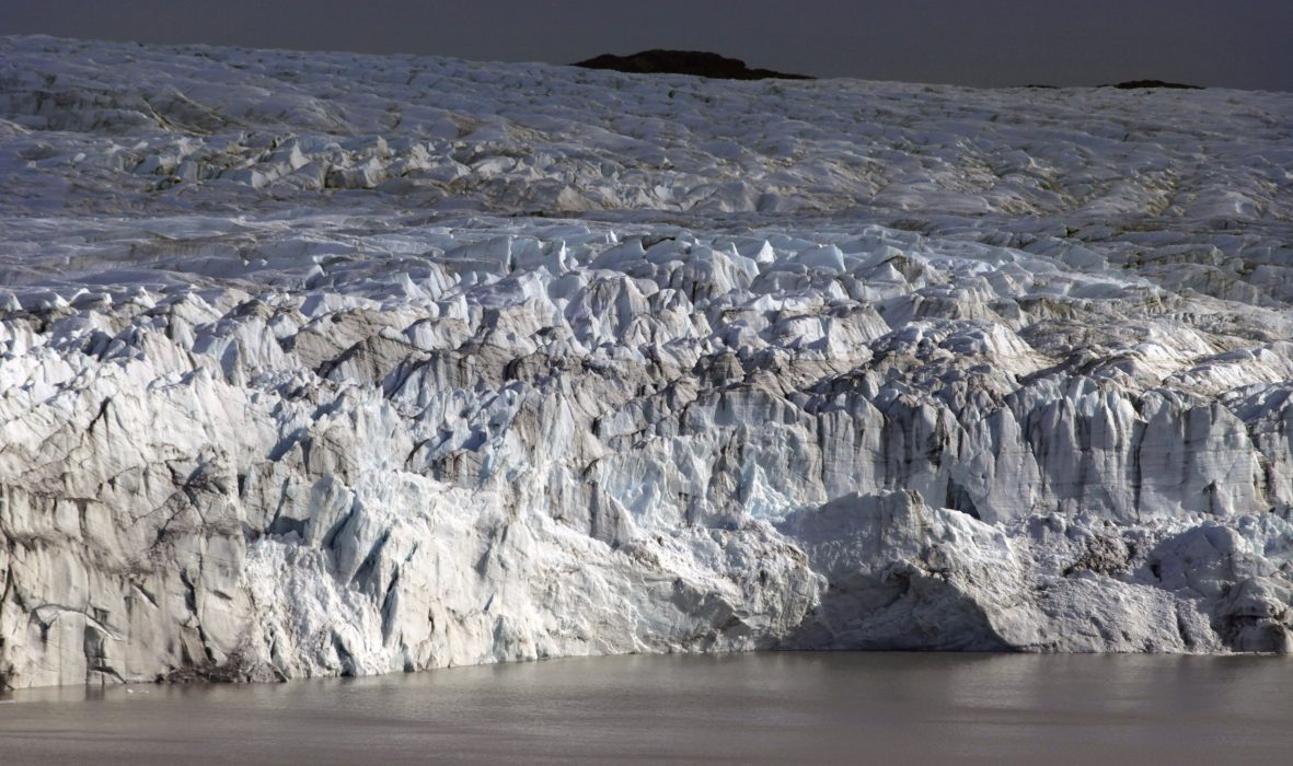 ADVANCE FOR USE MONDAY, AUG. 15, 2011 AND THEREAFTER - This July 17, 2011 photo shows the melting front of a glacier at the edge of the Greenland ice sheet, near Kangerlussuaq, Greenland. Greenland is the focus of many researchers trying to determine how much its melting ice may raise sea levels. (AP Photo/Brennan Linsley)