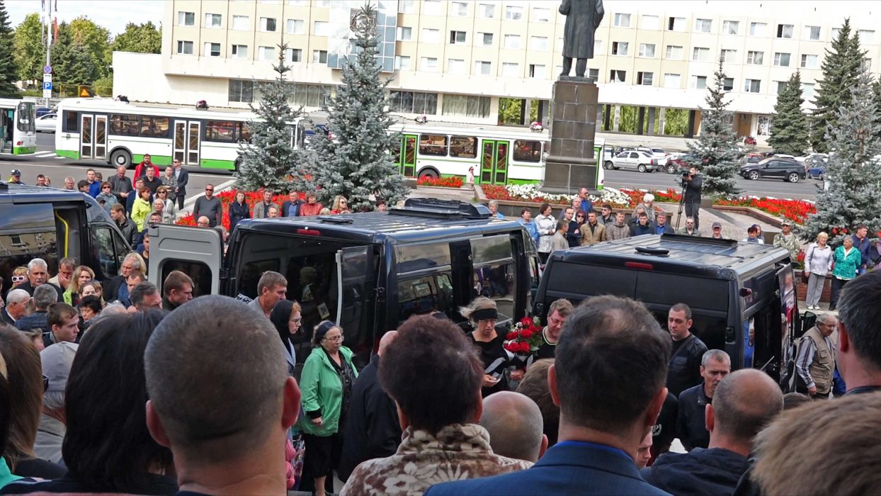 In this grab taken from a footage provided by the Russian State Atomic Energy Corporation ROSATOM press service, people gather for the funerals of five Russian nuclear engineers killed by a rocket explosion in Sarov, the closed city, located 370 kilometers (230 miles) east of Moscow, Monday, Aug. 12, 2019. Thousands of people have attended the burial of five Russian nuclear engineers killed by an explosion during tests of a new rocket. The engineers, who died on Thursday, were laid to rest Monday in the city of Sarov that hosts RussiaÄôs main nuclear weapons research center. (Russian State Atomic Energy Corporation ROSATOM via AP)