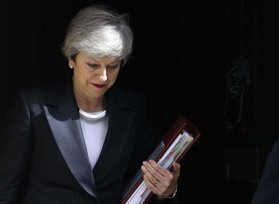 Britain's Prime Minister Theresa May leaves 10 Downing Street to attend the weekly session of Prime Ministers Questions in Parliament in London, Wednesday, May 22, 2019. (AP Photo/Kirsty Wigglesworth)