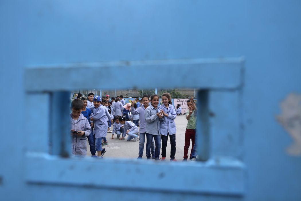 In this Tuesday, May 22, 2018 photo, Palestinian refugees students from Syria and Lebanon play during their break at the Jafna Elementary school, run by the U.N. Agency for Palestinian Refugees, UNRWA, in the eastern Bekaa Valley town of Taalabaya, Lebanon. Palestinians who fled to Lebanon to escape Syria?Äôs civil war fear they could lose access to education if the U.S. fails to fund UNWRA. That could force the closure of schools that have helped thousands of refugees continue their education and provided trauma counseling for children. (AP Photo/Hassan Ammar)