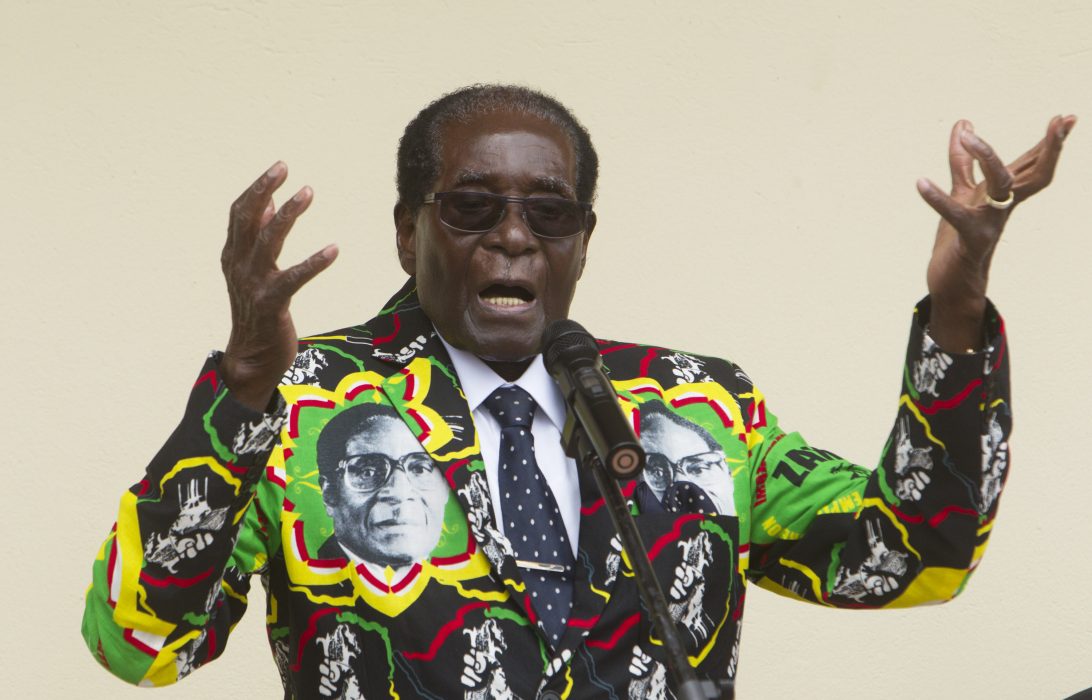 Zimbabwean President Robert Mugabe addresses people at an event before the closure of his party's 16th Annual Peoples Conference in Masvingo, about 300 kilometres south of the capital Harare, Saturday, December, 17, 2016. Mugabe officially opened the conference where he is set to be endorsed as the ruling party candidate for Presidential elections set for 2018.(AP Photo/Tsvangirayi Mukwazhi)
