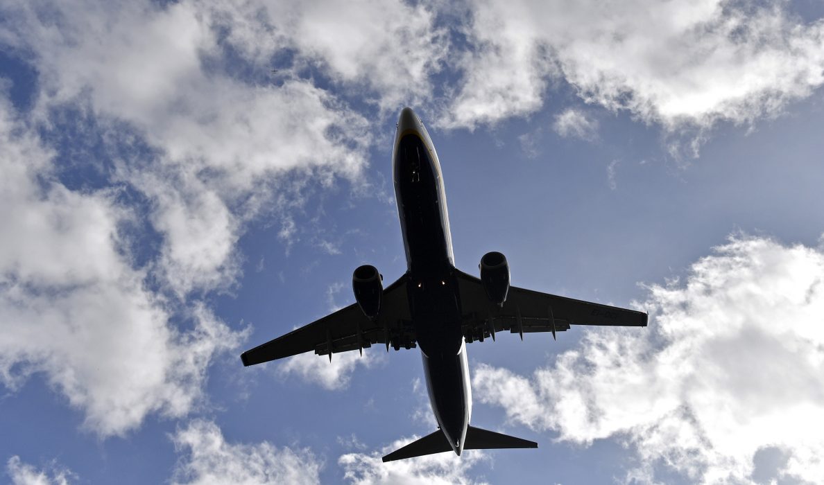 A Ryanair jet lands at the airport in Weeze, Germany, Wednesday, Sept. 12, 2018. Ryanair canceled flights after pilots and flight attendants started a one-day strike over pay and conditions. (AP Photo/Martin Meissner)
