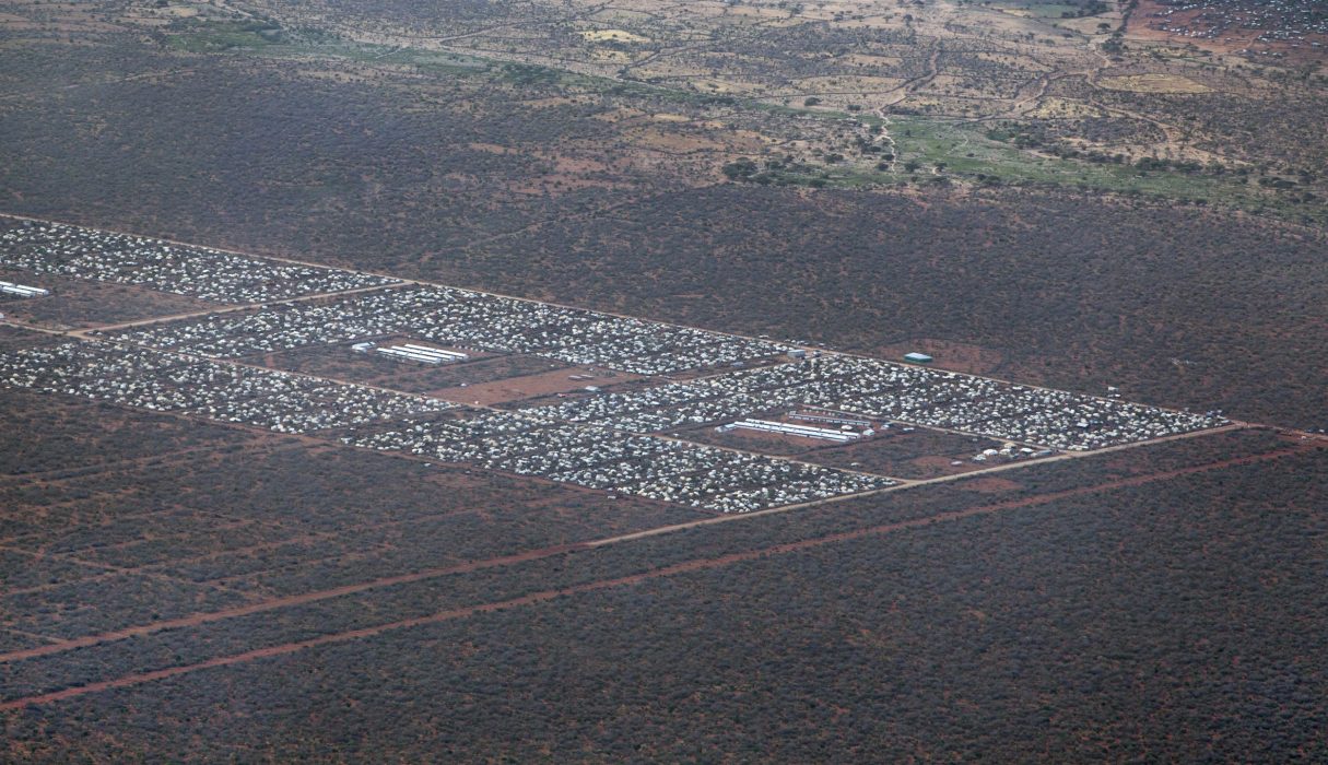 FILE - In this Monday Feb. 20, 2012 file photo, parts of Dadaab, the world's largest refugee camp, are seen from a helicopter in northern Kenya. A new agreement between Kenya, Somalia, and the U.N. refugee agency UNHCR was signed Sunday, Nov. 10, 2013 to encourage the nearly half million Somalis inside refugee camps in Kenya to return home - if they choose to do so. (AP Photo/Ben Curtis, File)