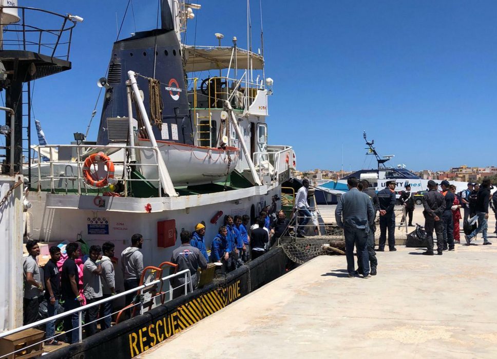 Rescued migrants desembark from the Mare Jonio rescue ship of the Italian NGO Mediterranea Saving Humans as it docked at the port of the Italian island of Lampedusa, southern Italy, Friday, May 10, 2019. According to Mediterranea Saving Humans, some 30 migrants, including two pregnant women and a small child, were rescued a day earlier off the Libyan coast. (Elio Desiderio/ANSA via AP)